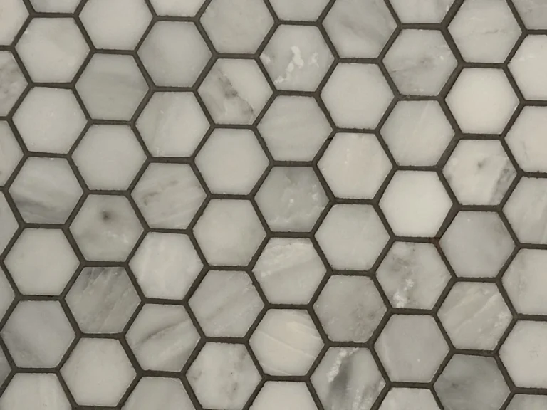 White marble hexagon tile pattern close-up