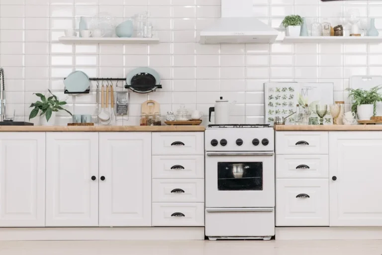 White subway tile backsplash in a bright vintage-style kitchen