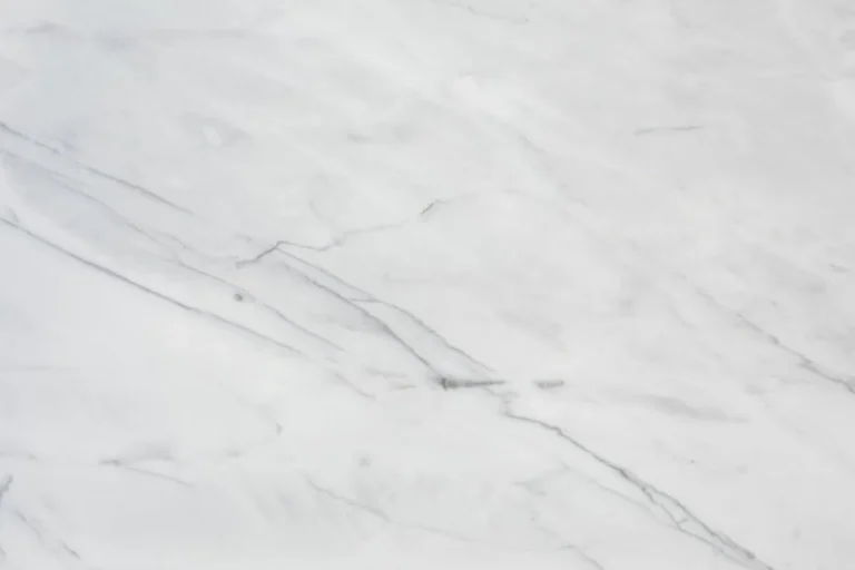White Carrara marble surface with delicate gray veining