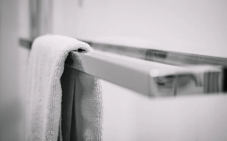 Towels hanging on a bathroom rail