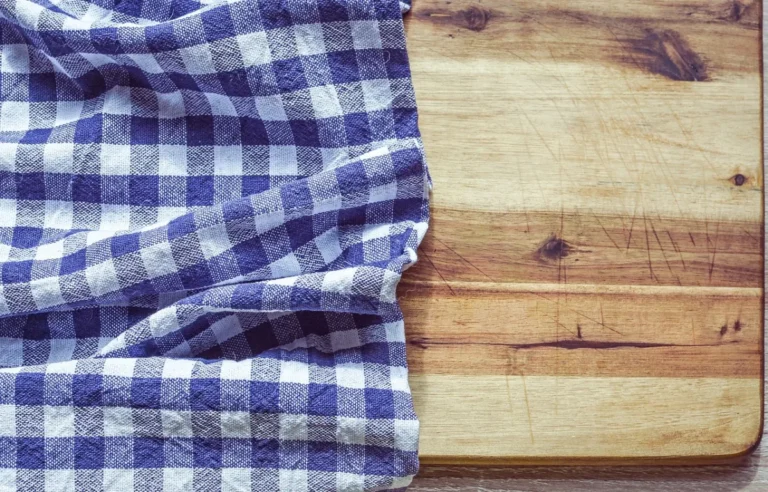 Sage gingham tablecloth on a cottage kitchen table