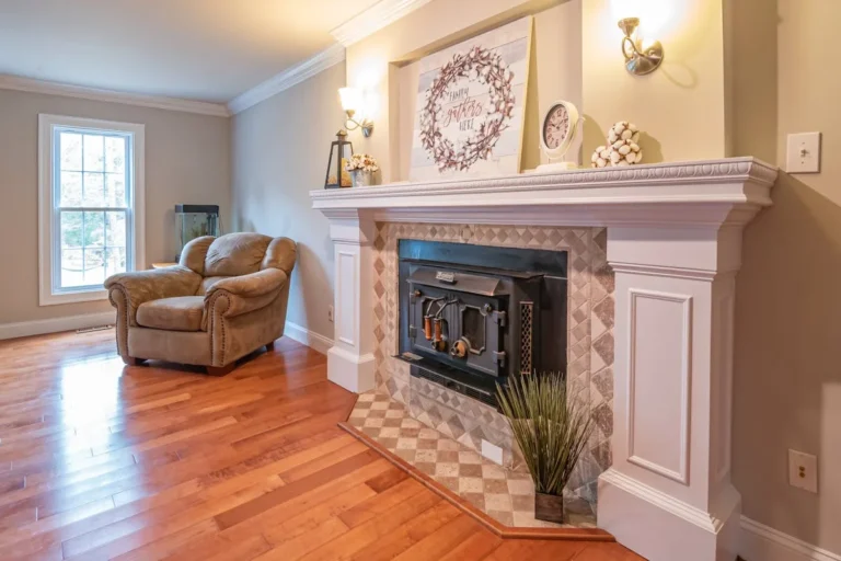 Living room fireplace mantel with crown molding above