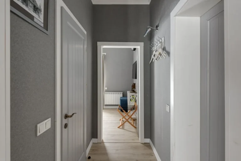 Over-the-door organizer rack near an entry