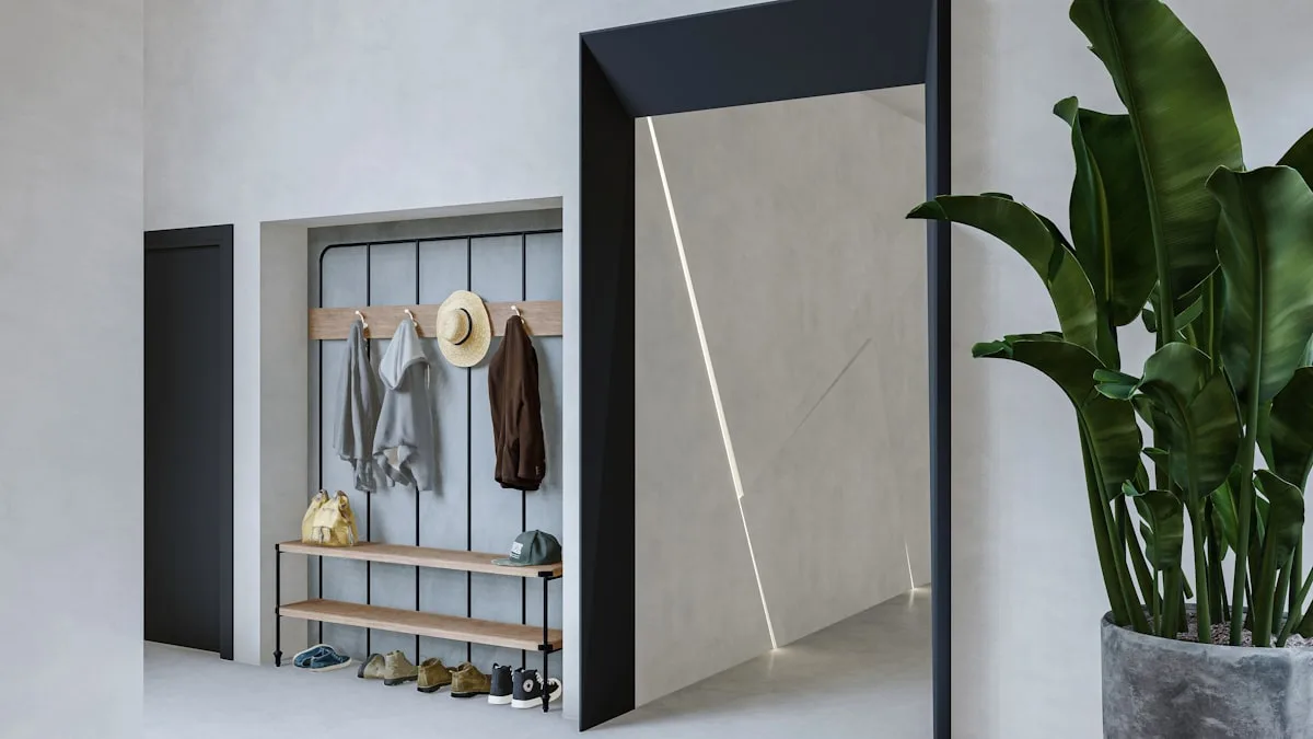 Entryway wall hooks with coats and a shoe bench below