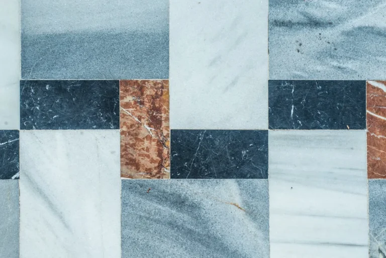 Multi-color marble floor tile pattern detail