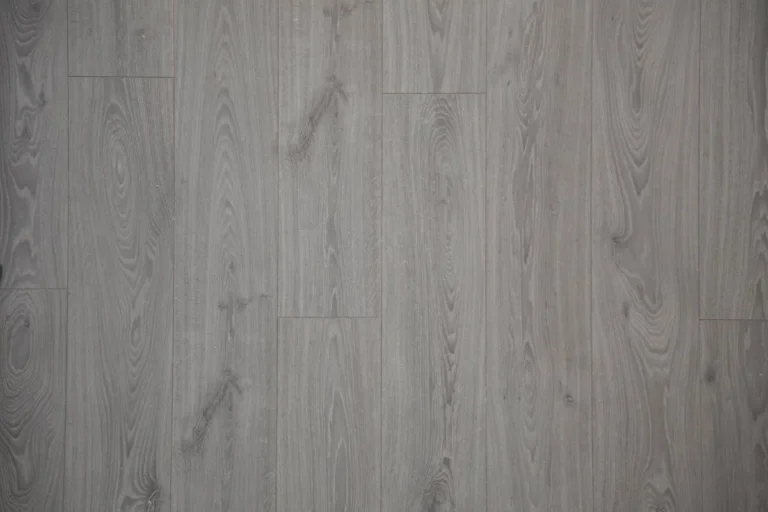 Light grey wood-look vinyl plank flooring close-up