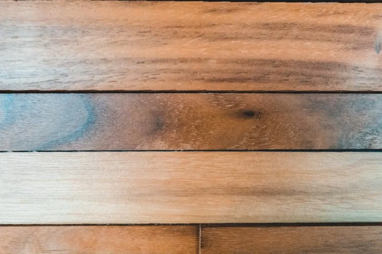 Warm walnut wood plank flooring close-up