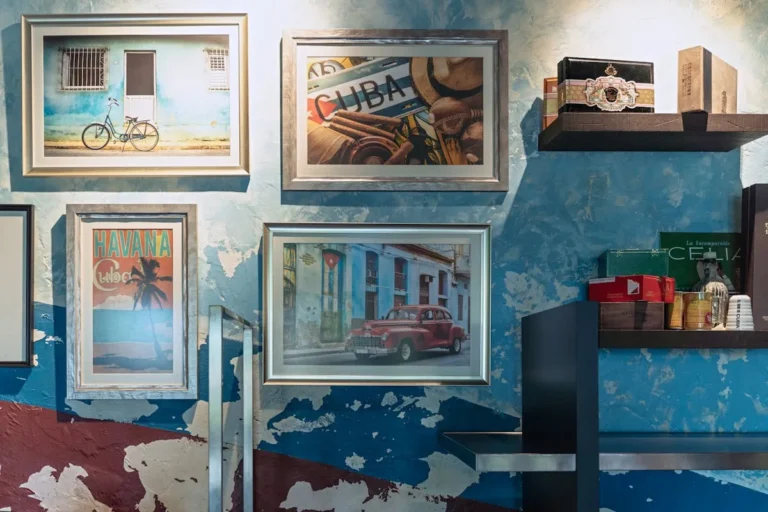 Mid-century abstract prints arranged on a living room wall