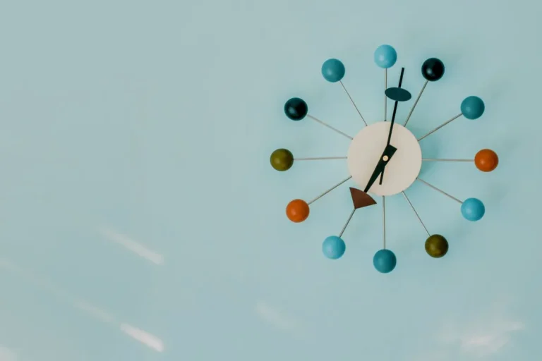 Starburst wall clock on a mid-century styled wall