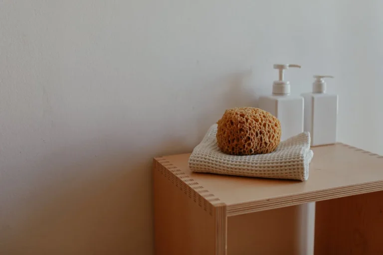 Minimalist white bathroom shelf with organizers