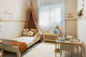 Peel-and-Stick Wall Decals for Renters: 8 Picks That Look Like You Meant It (and Three That Read Cheap) Childrens bedroom with a name wall decal above a single bed and a hanging canopy