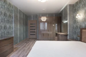 Peel-and-Stick Wallpaper Ideas: 12 Places to Use It That Are Not the Obvious Accent Wall Bedroom with patterned peel-and-stick wallpaper installed on multiple walls