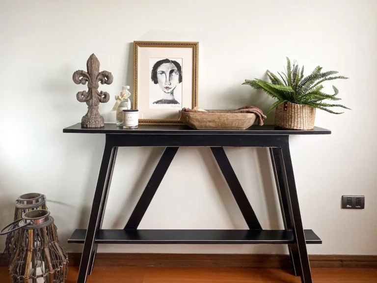 Slim console table in a narrow entryway