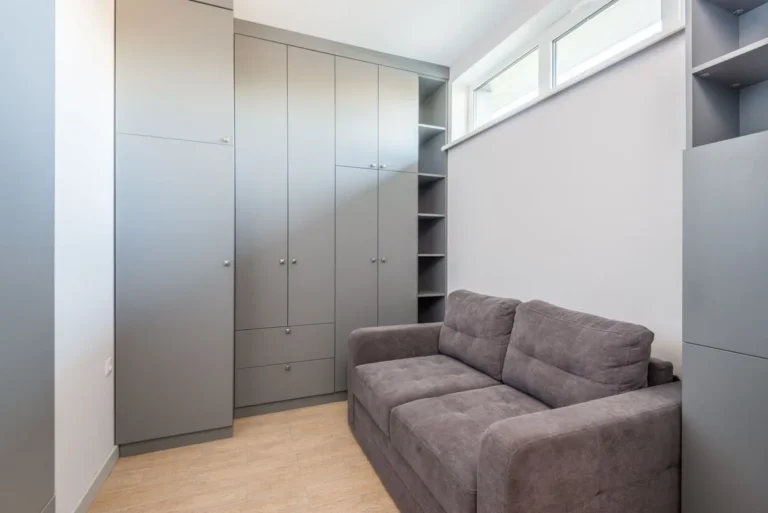 Small sofa with a storage chaise in a compact living room
