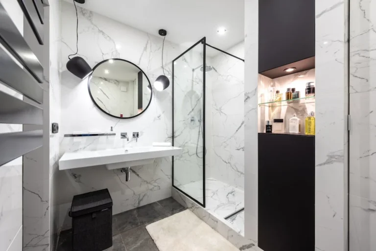 Corner shower shelf holding toiletries